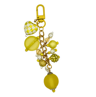 Handmade yellow purse charm titled 