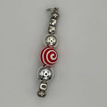 Load image into Gallery viewer, Handmade "Velocity Pop" silver Luxe Pillar purse charm with a red and white peppermint swirl resin focal bead and geometric silver spacers, part of the Bougie Buildable set.
